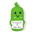 Green pickle squeaky dog toy with textured surface for teeth cleaning