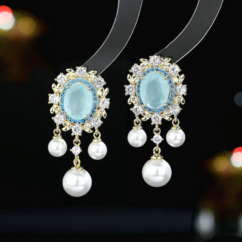 Oval geometric earrings with zircon inlay and pearl tassels in light purple colour