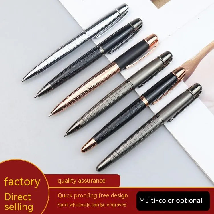Grey metal roller pen with gun-shaped barrel on white background