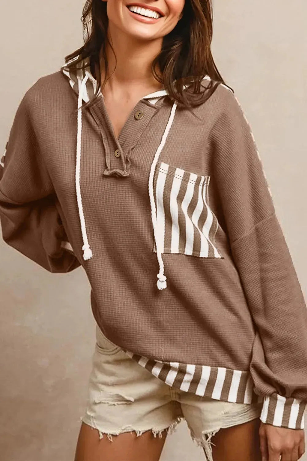 Straw yellow waffle texture hoodie with patchwork stripes, button neck, and drawstring hood