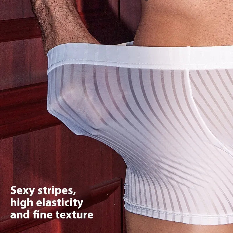 Men's black striped nylon boxer briefs laid flat, showing seamless construction and elastic waistband.