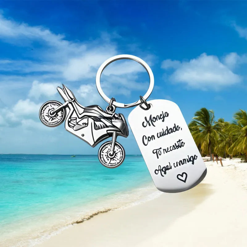 Stainless steel motorcycle keychain with inspirational engraving and a flannel storage bag.