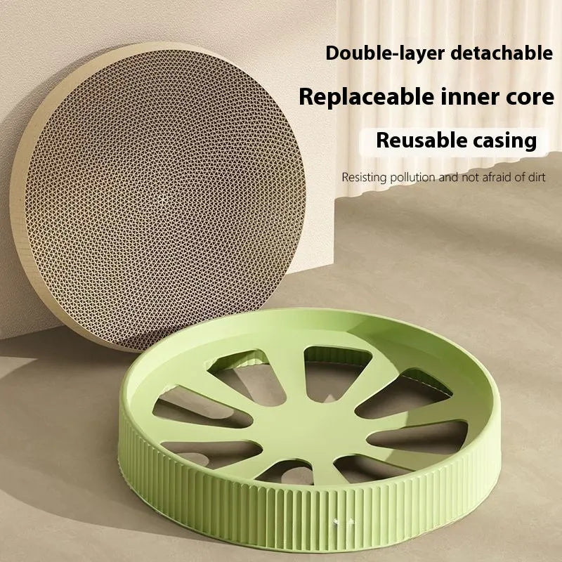 Round green cat scratching board made from corrugated cardboard with two replacement inserts