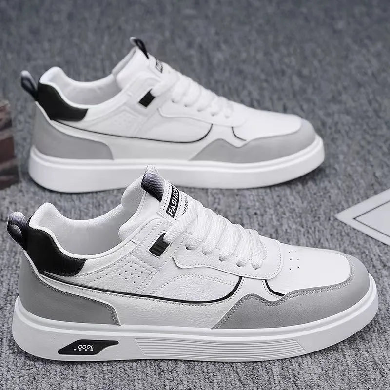 Men's low-top canvas board shoes in black with leather stitching and mesh lining.