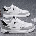 Men's low-top canvas board shoes in black with leather stitching and mesh lining.
