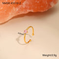 Open ended heart shaped ring with zircon accents in stainless steel showing geometric design details