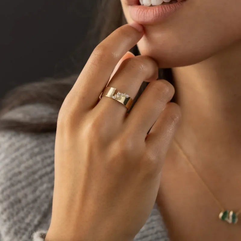 Gold electroplated copper fashion ring with shining zircon detail showing front view