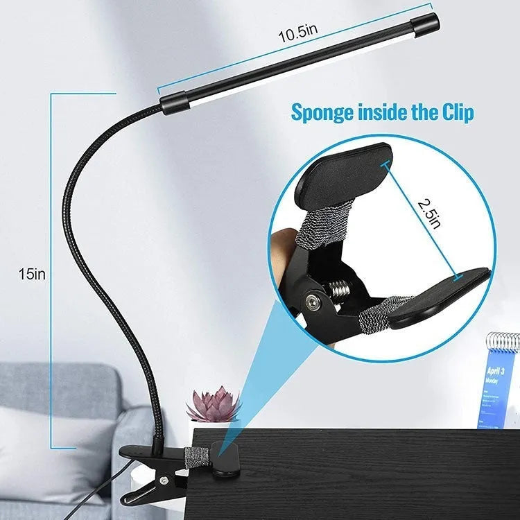 Black and white USB-powered LED desk lamp with 26 cm length for study desks.