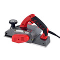 Red electric wood planer tool with aluminium body for carpentry work