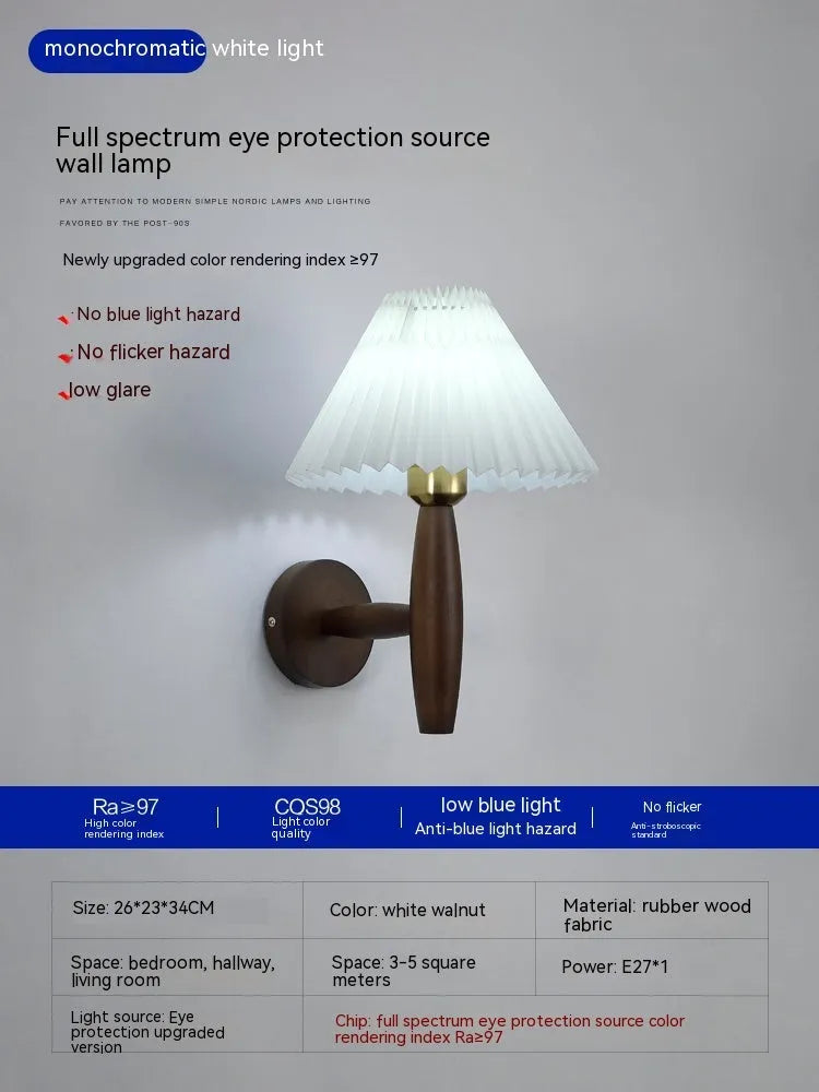 Walnut wood and copper American retro wall lamp with fabric shade on a wall.