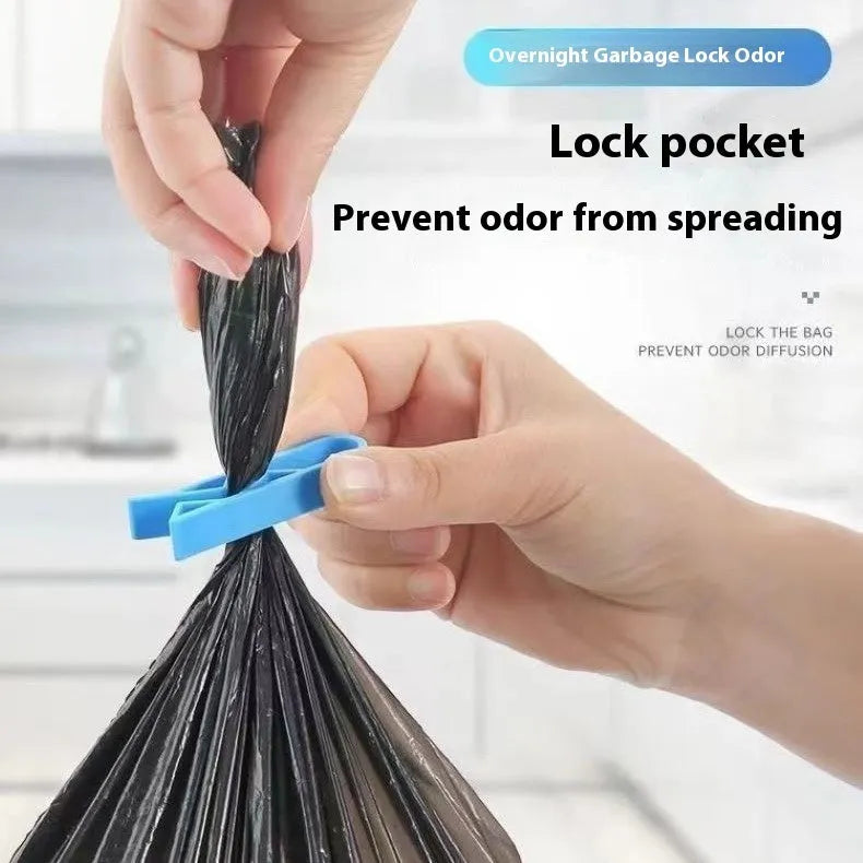 Grey PP plastic non-slip clip for securing bin bags to a rubbish bin rim.
