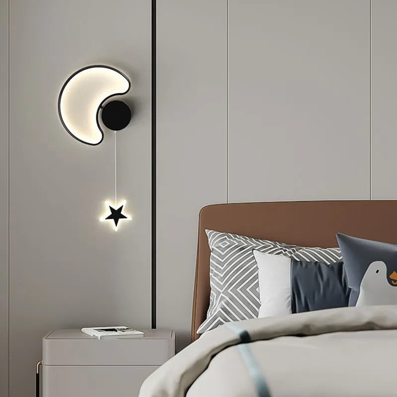 Cloud and star shaped children's bedside wall lamp with LED lighting in black or white finish