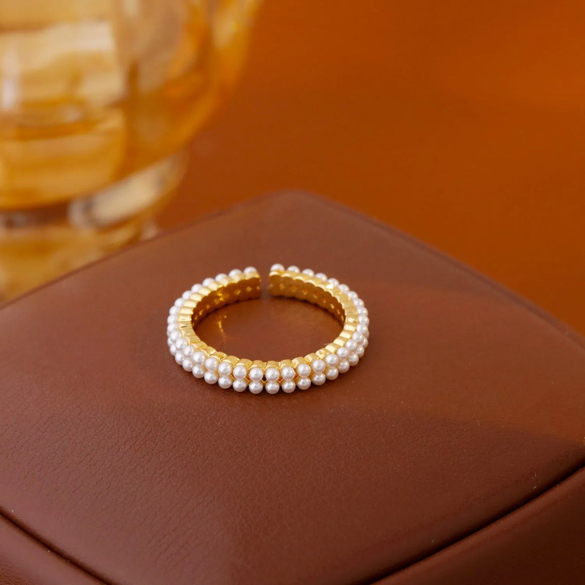 Gold electroplated women's ring with open mouth design and geometric modelling