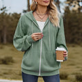Green women's hooded zipper coat with full-length front zip, loose fit, and long sleeves.