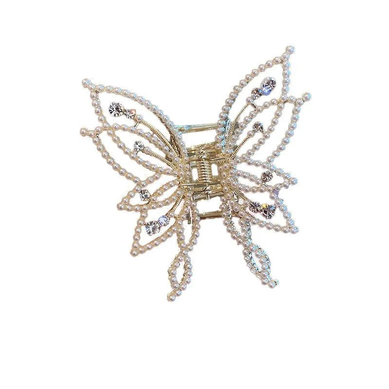 Alloy butterfly hair barrette clip with electroplated finish, shown in rhinestone and pearl style options