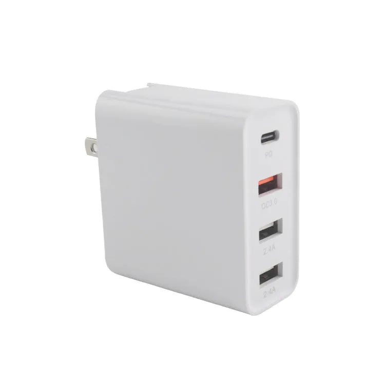 Four-port USB-C wall charger with LED light in black or white colours showing UK, EU, US and AU plug variants