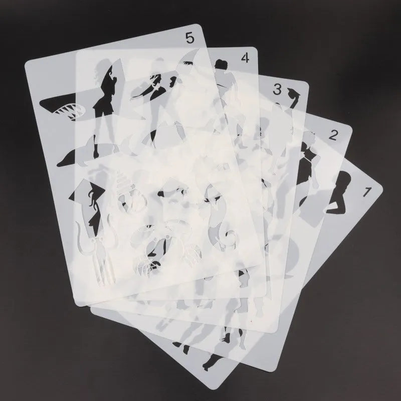Plastic drawing stencil set with multiple template designs for craft projects