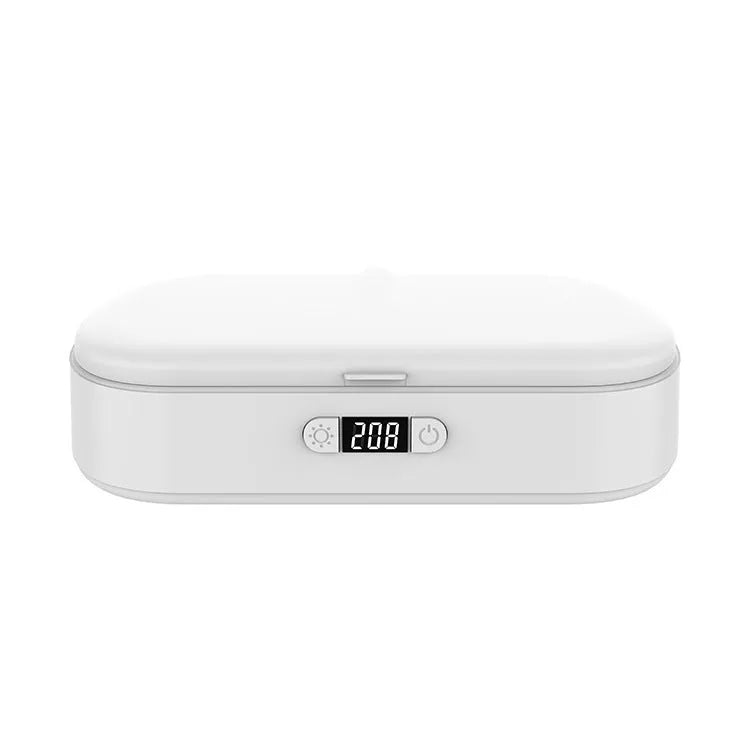 White ultraviolet steriliser box with wireless charging for mobile phones and personal items
