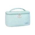 Open-top round cake makeup bag in a choice of six solid colours made from PU leather.