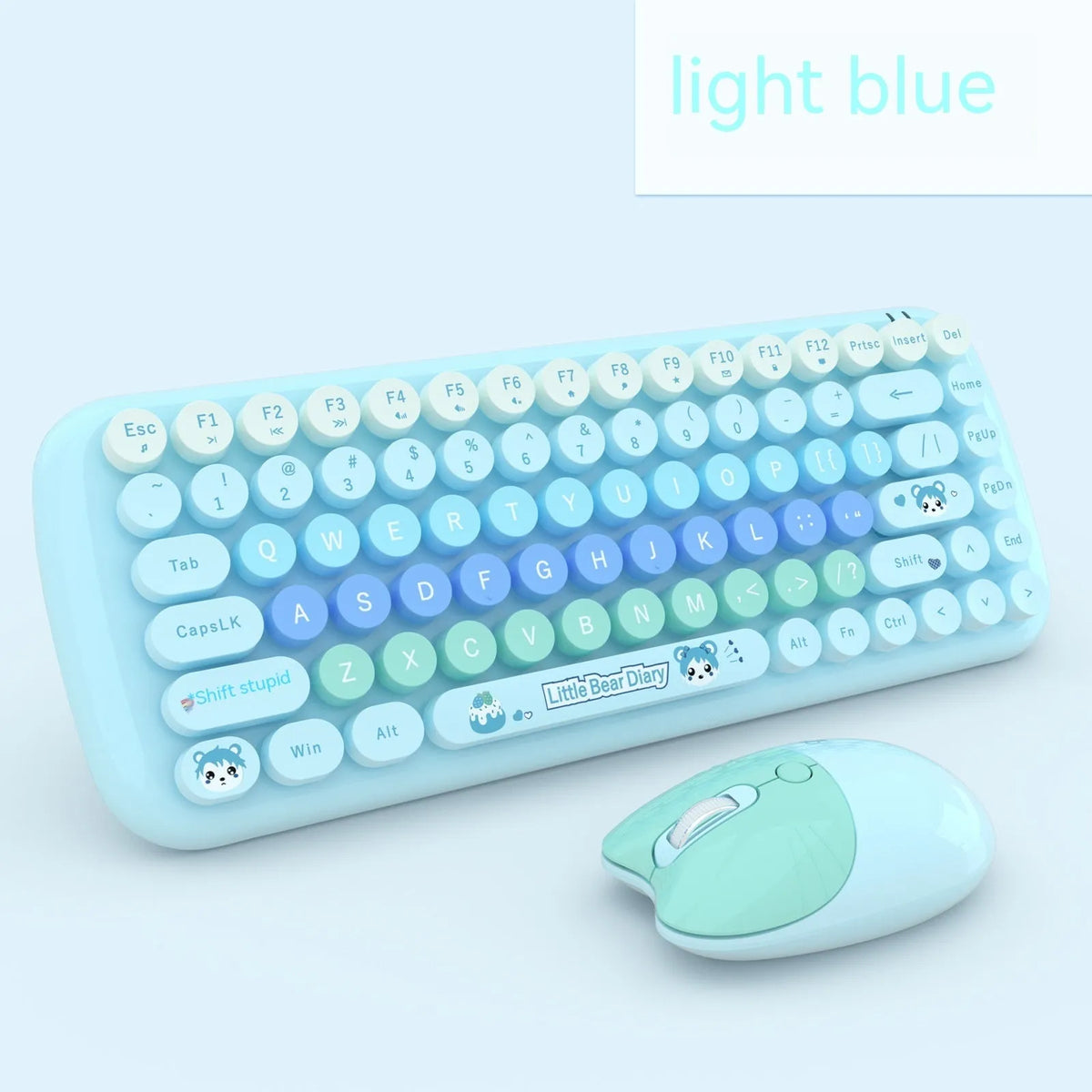 Candy pink mini wireless keyboard and mouse set with USB receiver on a desk.