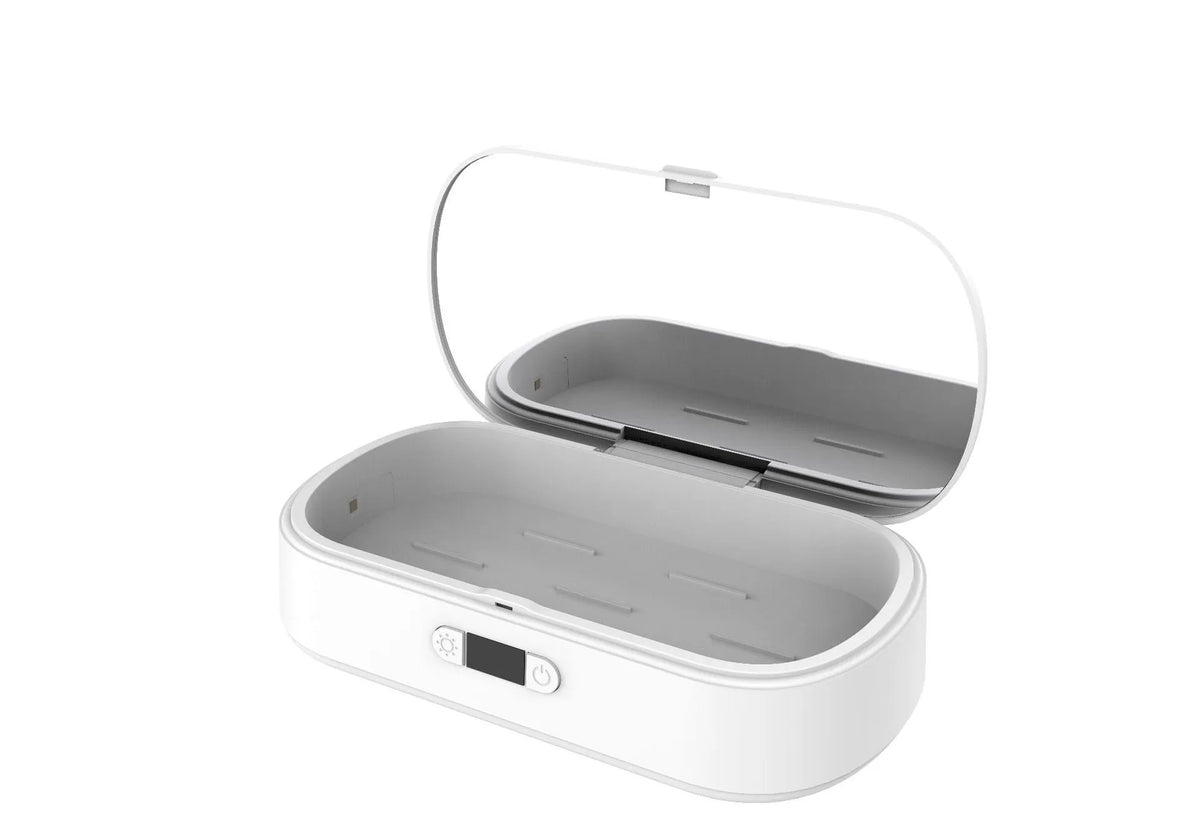 White ultraviolet steriliser box with wireless charging for mobile phones and personal items