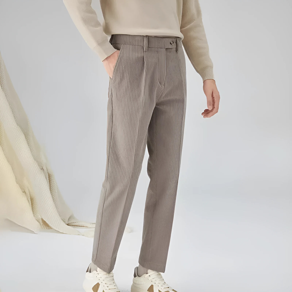 Corduroy straight-leg men's trousers in beige colour showing texture detail