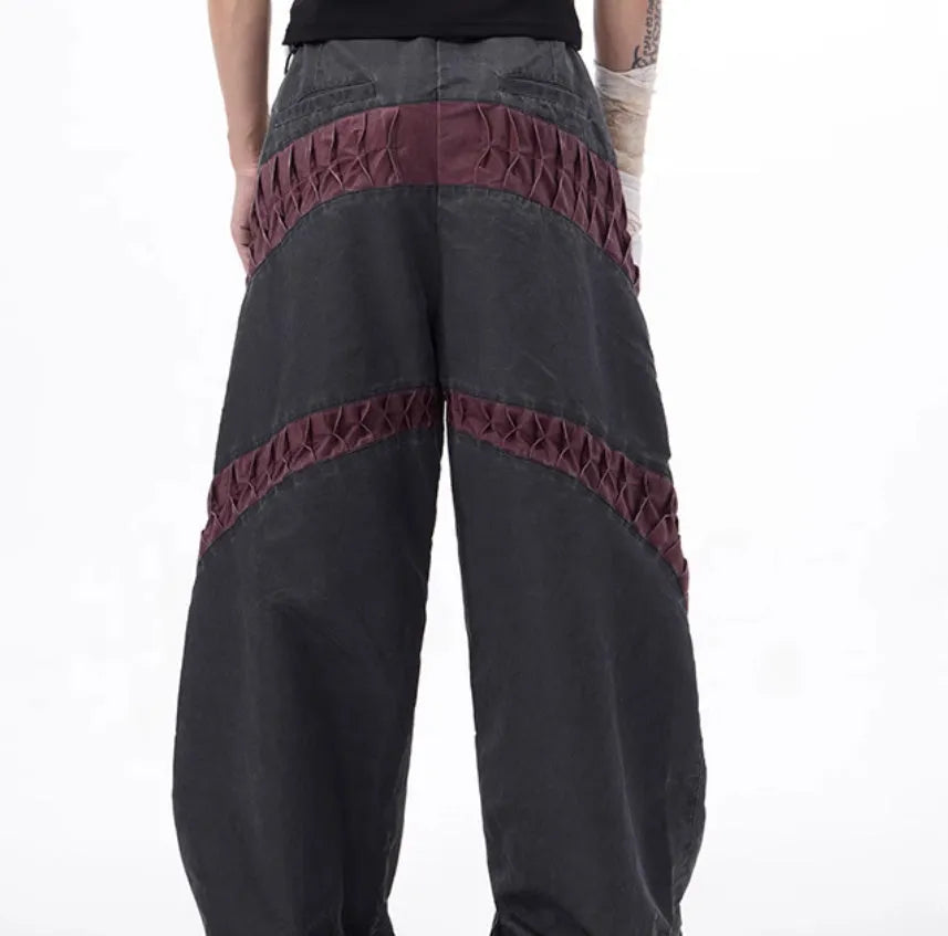 Retro grey three-dimensional keel casual sports pants on a model, showing straight hem and tight fit.