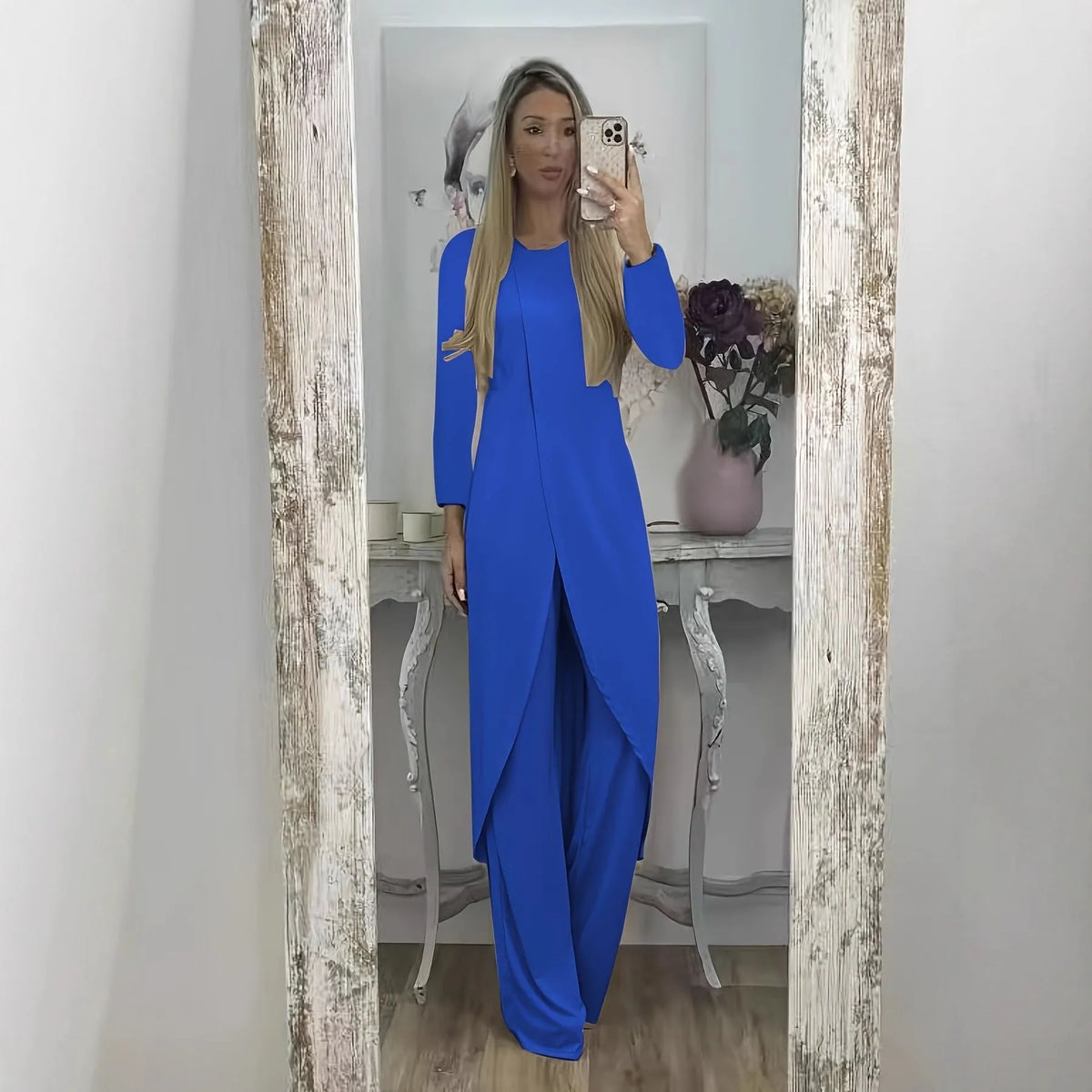 Polyester two-piece lounge set with long sleeves and loose trousers in black