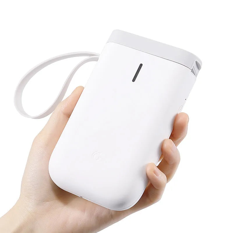 D11 Bluetooth thermal label printer in black, white, green, or pink next to a smartphone showing the label design app.