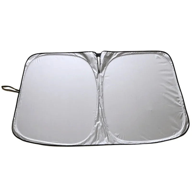 Aluminium foil car sunshade in silver colour showing reflective surface and folded edges