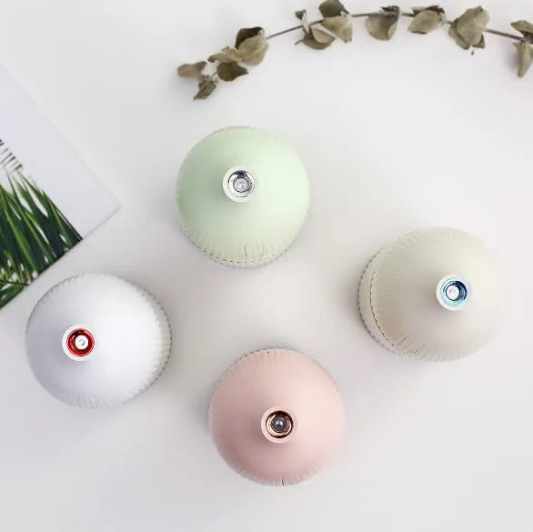 White ultrasonic aromatherapy diffuser humidifier with 300ml capacity and USB connection