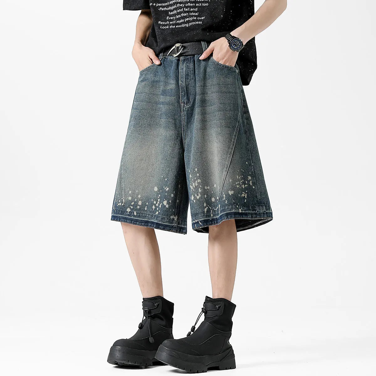 Men's retro washed blue denim shorts with splash ink detailing and ripped accents