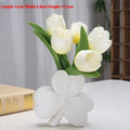 White porcelain clover-shaped ceramic vase in light green, pink, red, or white colours.