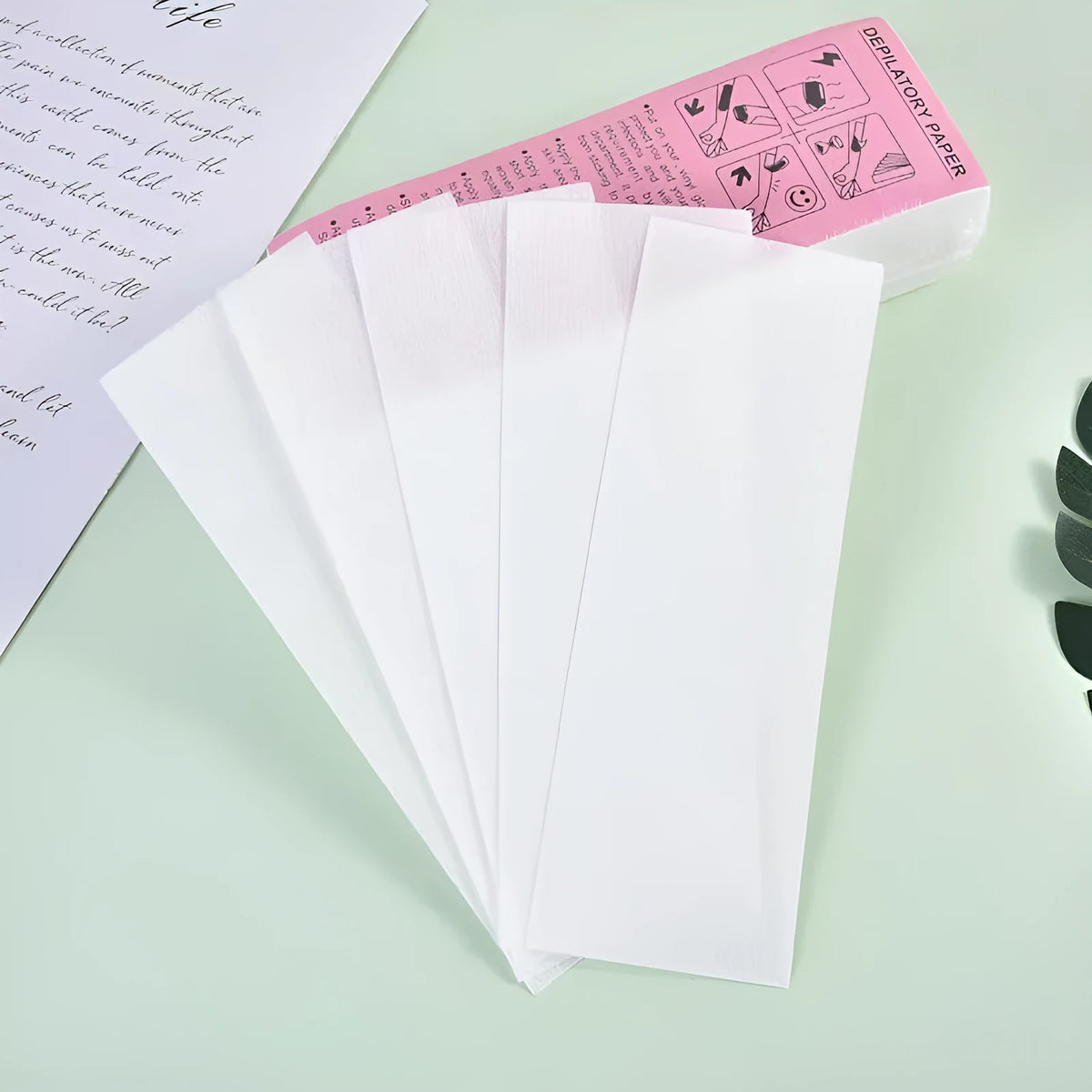 Pack of non-woven fabric hair removal wax strips for waxing treatments