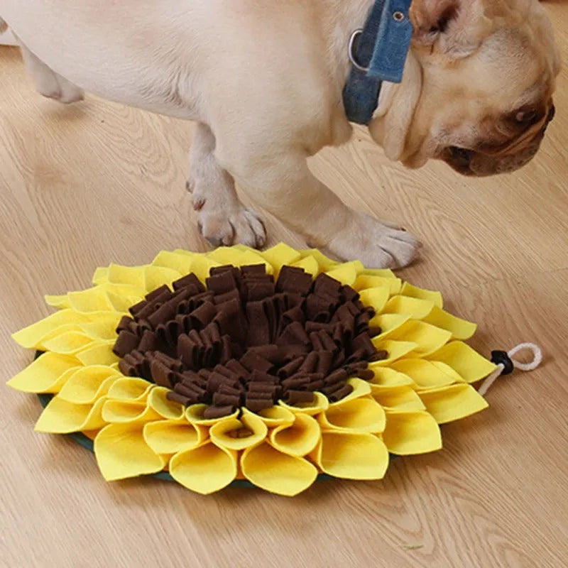 Yellow sunflower shaped dog snuffle mat with fleece petals for hiding treats during nosework training