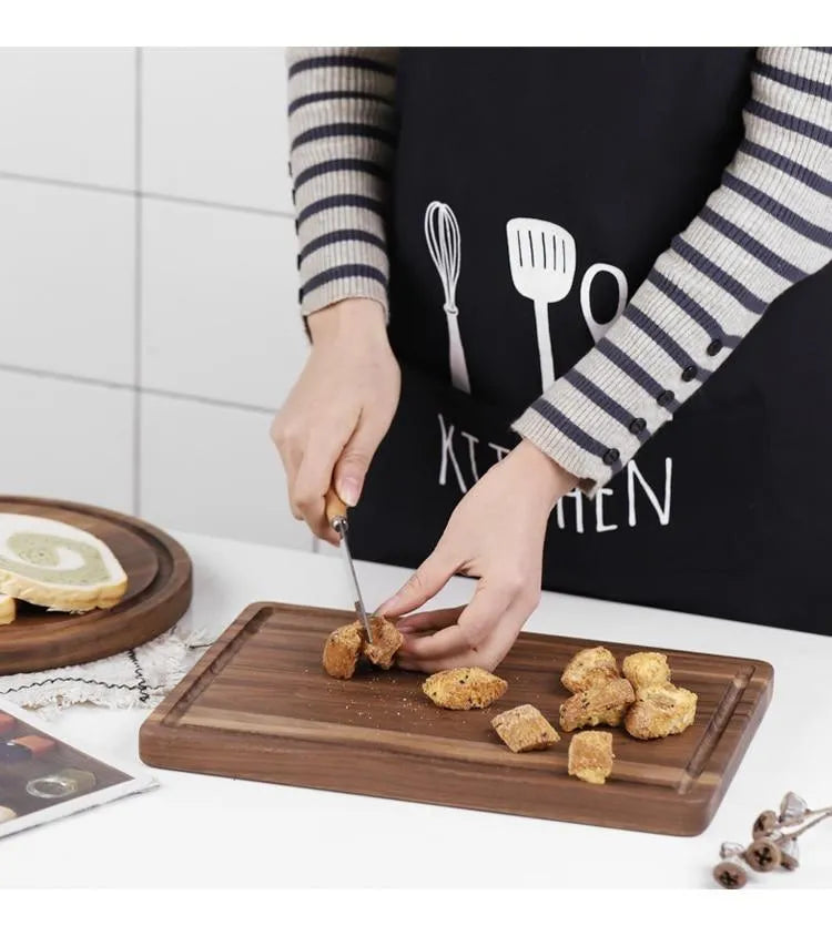 Black walnut wood cutting board with juice groove and engraved handle in three size options