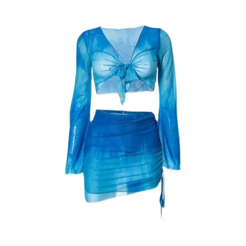Blue high-waisted women's bikini set with matching shirt and skirt laid flat