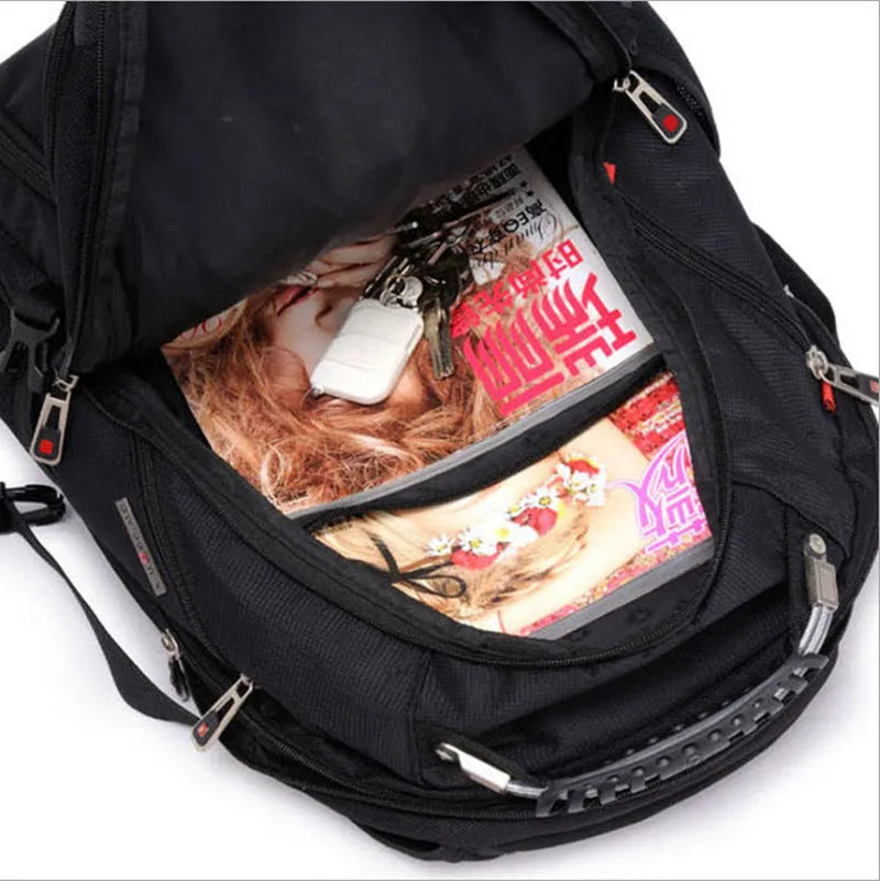 Black business laptop backpack showing three compartments open with laptop in padded section
