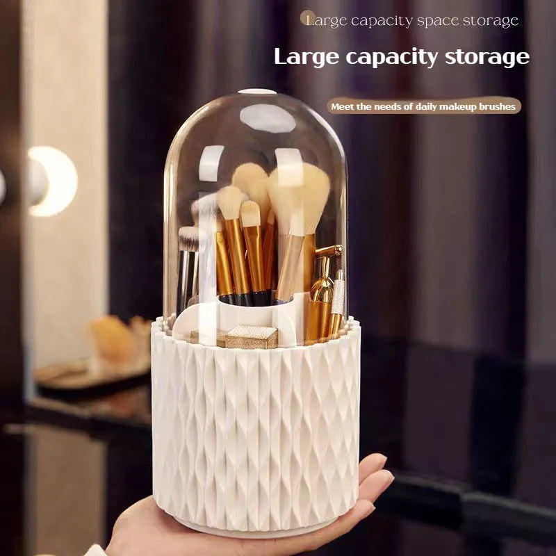 White rotating acrylic makeup brush holder with transparent lid on a desktop