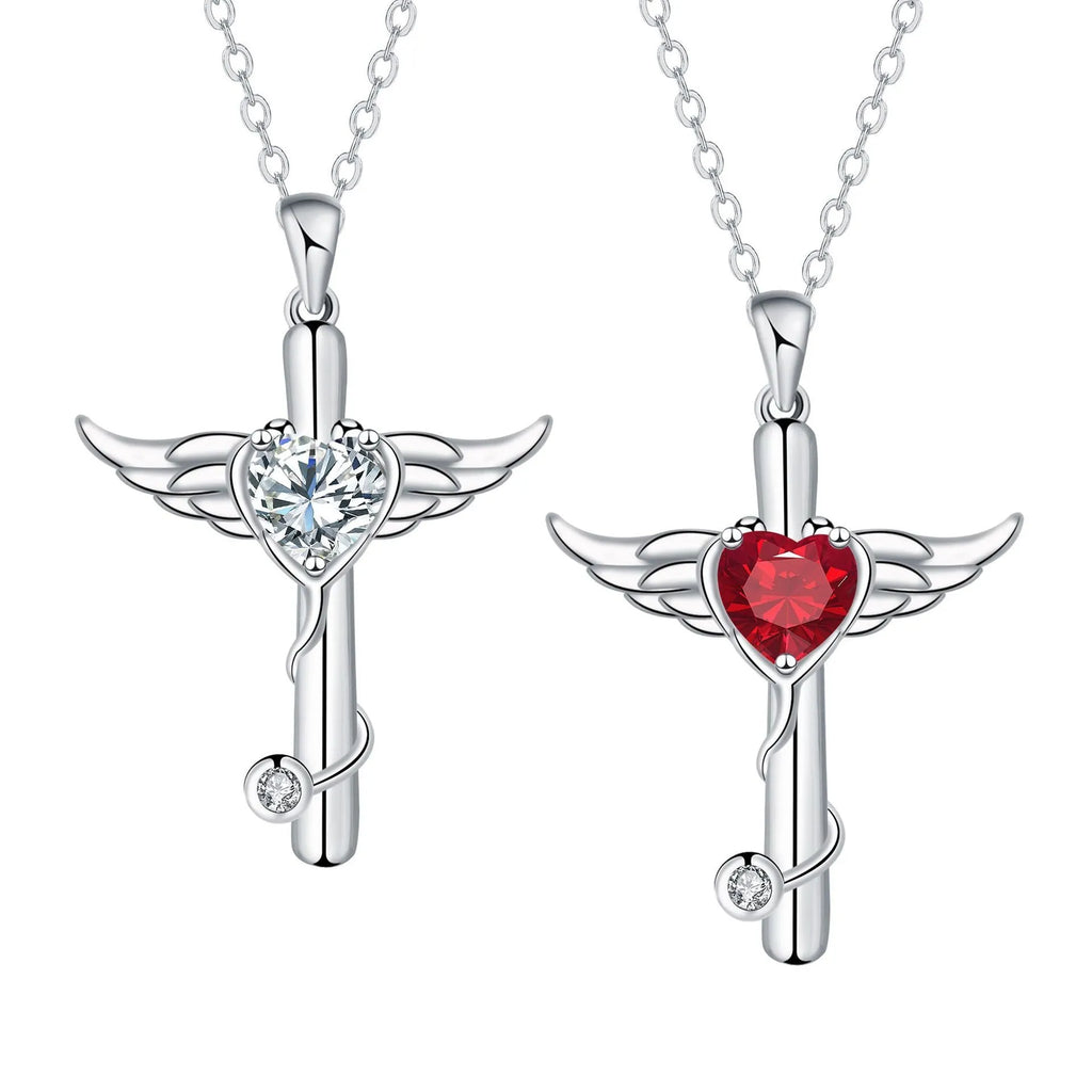 Close-up of a copper stethoscope cross pendant with wing details on a chain, available in Red Diamond or White Diamond finish.