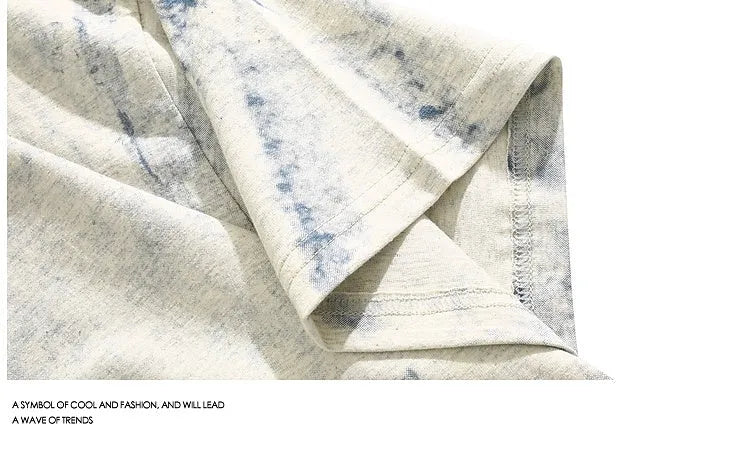 Grey tie dye patterned loose fit t-shirt with short sleeves and round neck collar