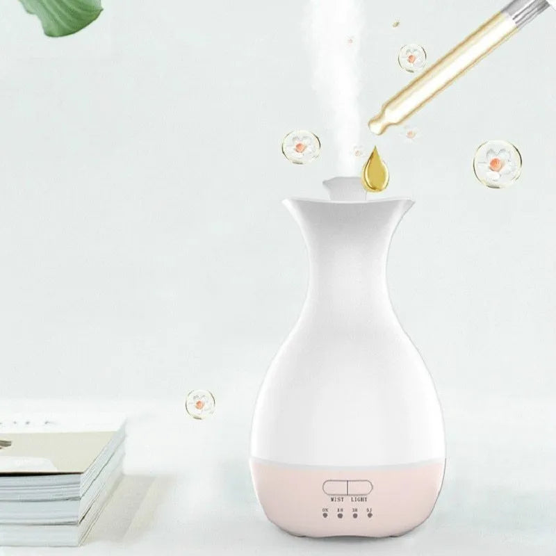 White ultrasonic aromatherapy vase with 200ml capacity, night light, and timer controls for home fragrance diffusion