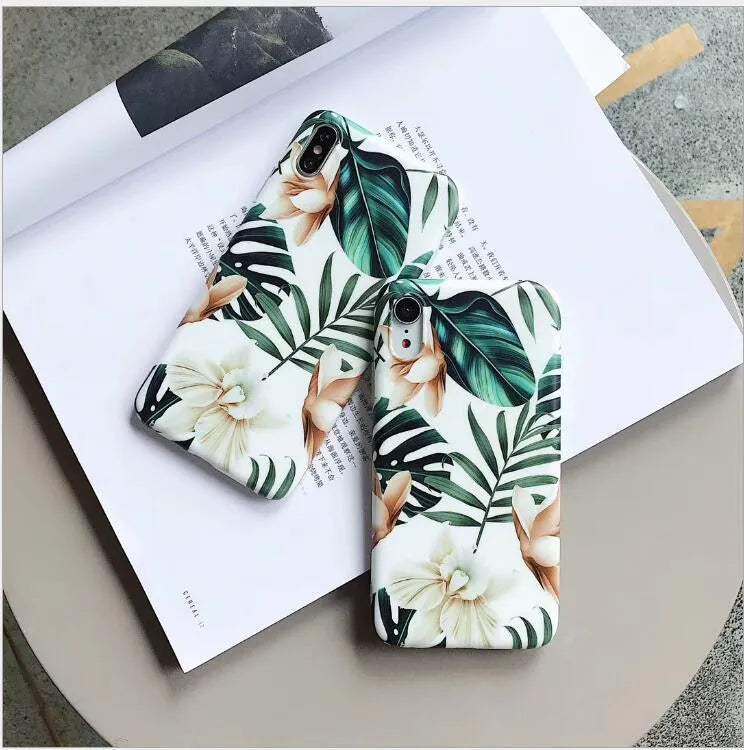 Floral banana leaf design on a flexible TPU phone case for compatible iPhone models.
