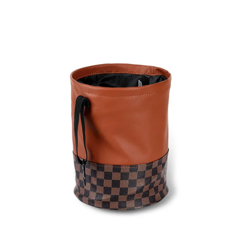 A leather interior car trash can shown in a folded and unfolded state.