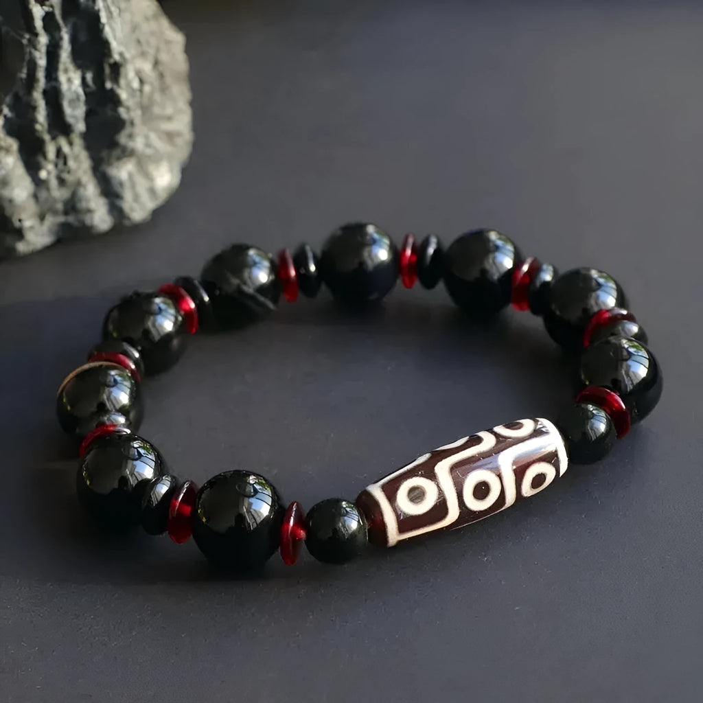 Black agate dzi bead bracelet with 11mm geometric beads in hand-woven unisex design