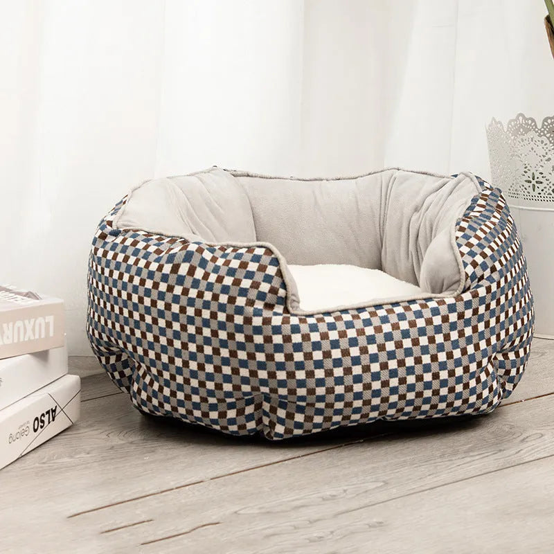 Blue octagonal pet bed with high sides, soft interior, and a removable mat for a cat or small dog.