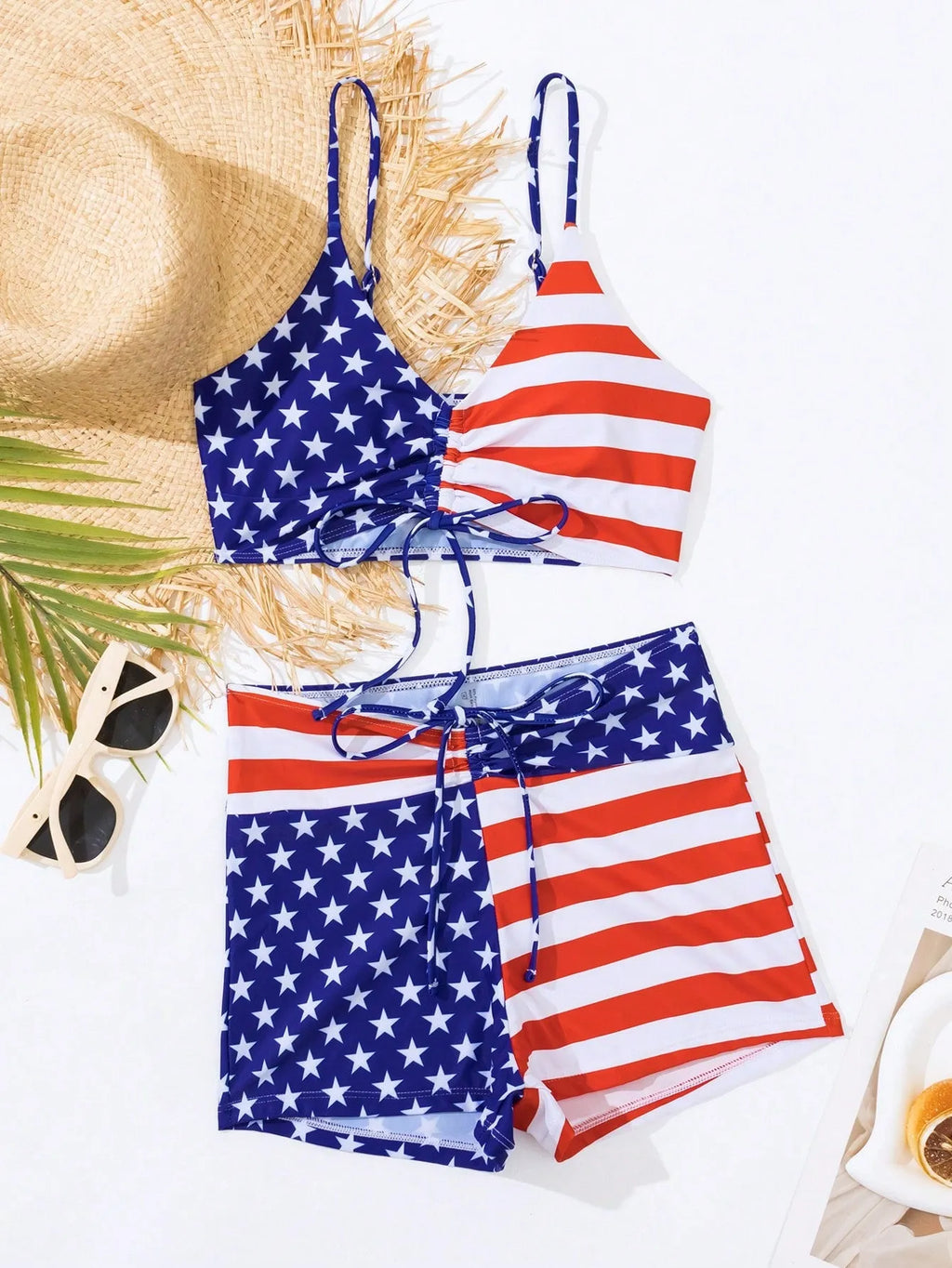 Women's high waist swimsuit briefs in a Stars and Stripes pattern with a drawstring waistband.
