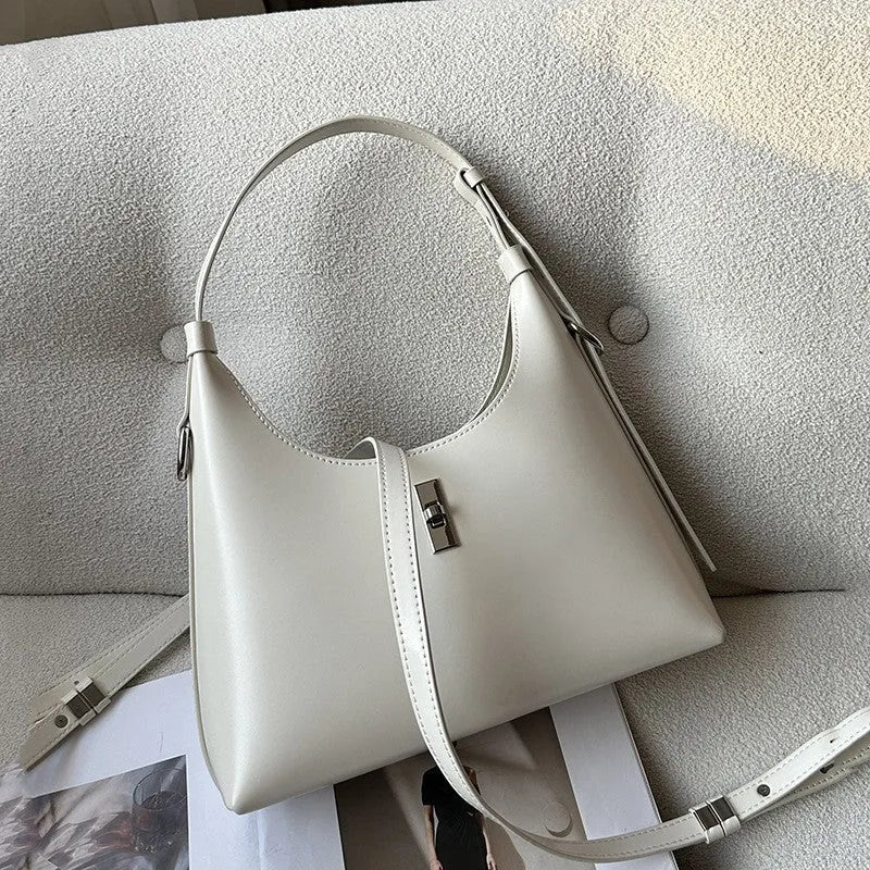 Genuine leather dumpling-shaped crossbody shoulder bag with change pocket and mobile phone compartment