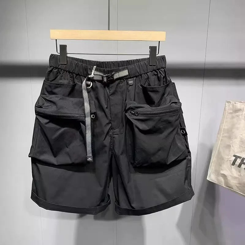 Men's large size work shorts with pockets in black or grey colours showing above knee length and loose fit design