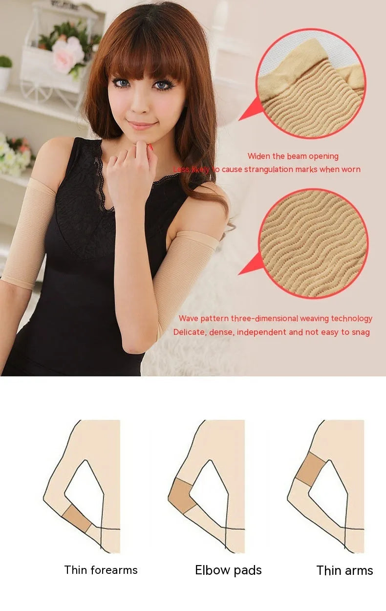 Women's black nylon shaping arm sleeves laid flat showing free size design